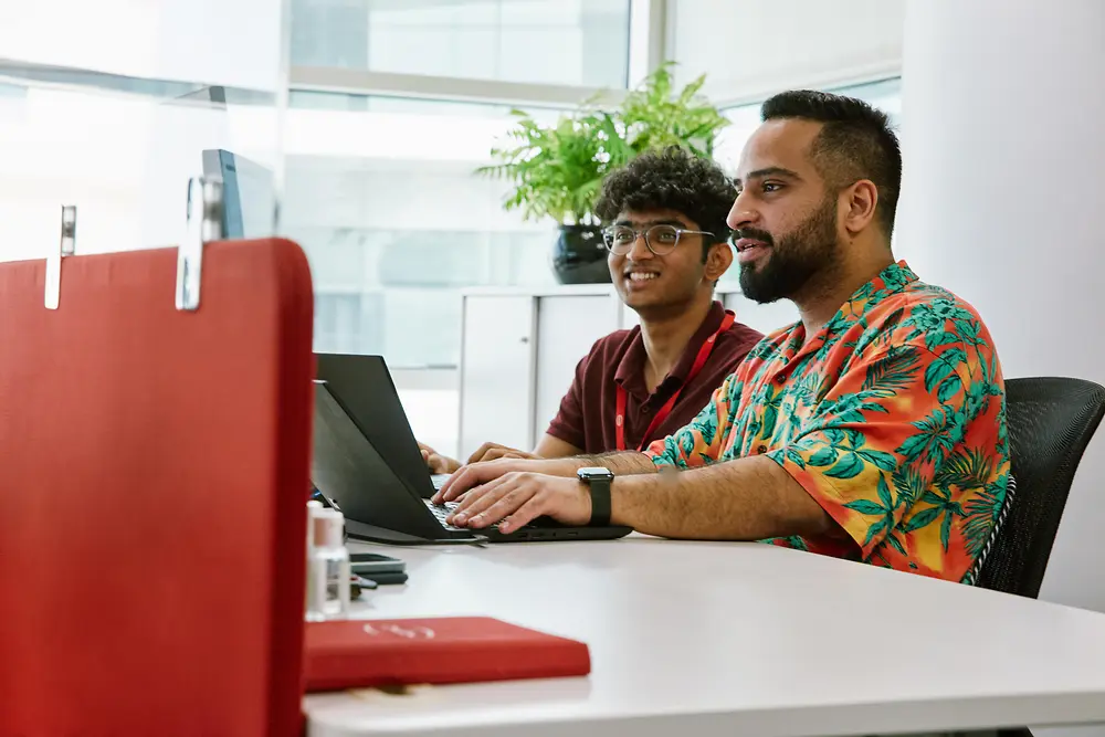 Digitale Spezialist:innen entwickeln gemeinsam zukunftsorientierte Lösungen in einem Henkel Tech Hub.