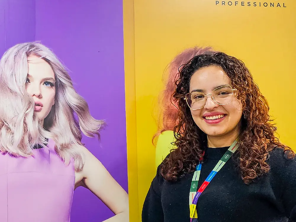 Henkel success story featuring Angie, who started with two internships in 2021, advanced to a managerial role in Colombia in 2022, and now leads Sales Controlling for the Andean Cluster while stepping into Net Revenue Management.